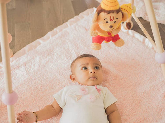Hang your mini Hanuman from your babys gym or crib to watch them engage and learn about the Hindu God