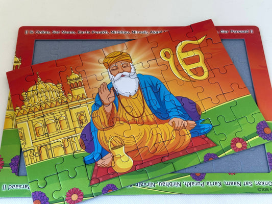 Jigsaw puzzle of Guru Nanak and the golden temple with the mool mantra in the border