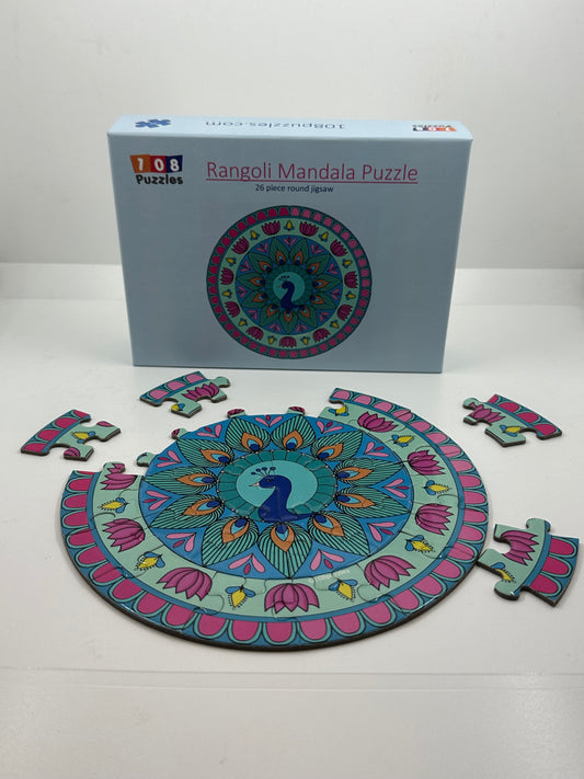 Colourful mandala puzzle with pieces assembled on a white wall next to its packaging box.