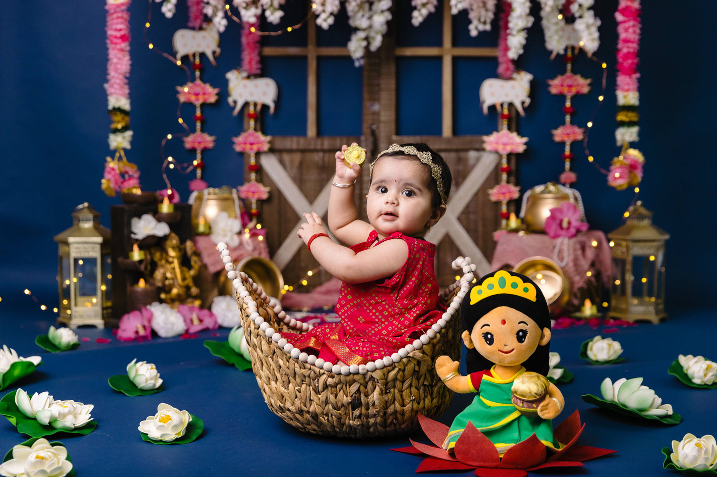 Newborn baby shoot with Laxmi mata plush toy taken at Diwali time