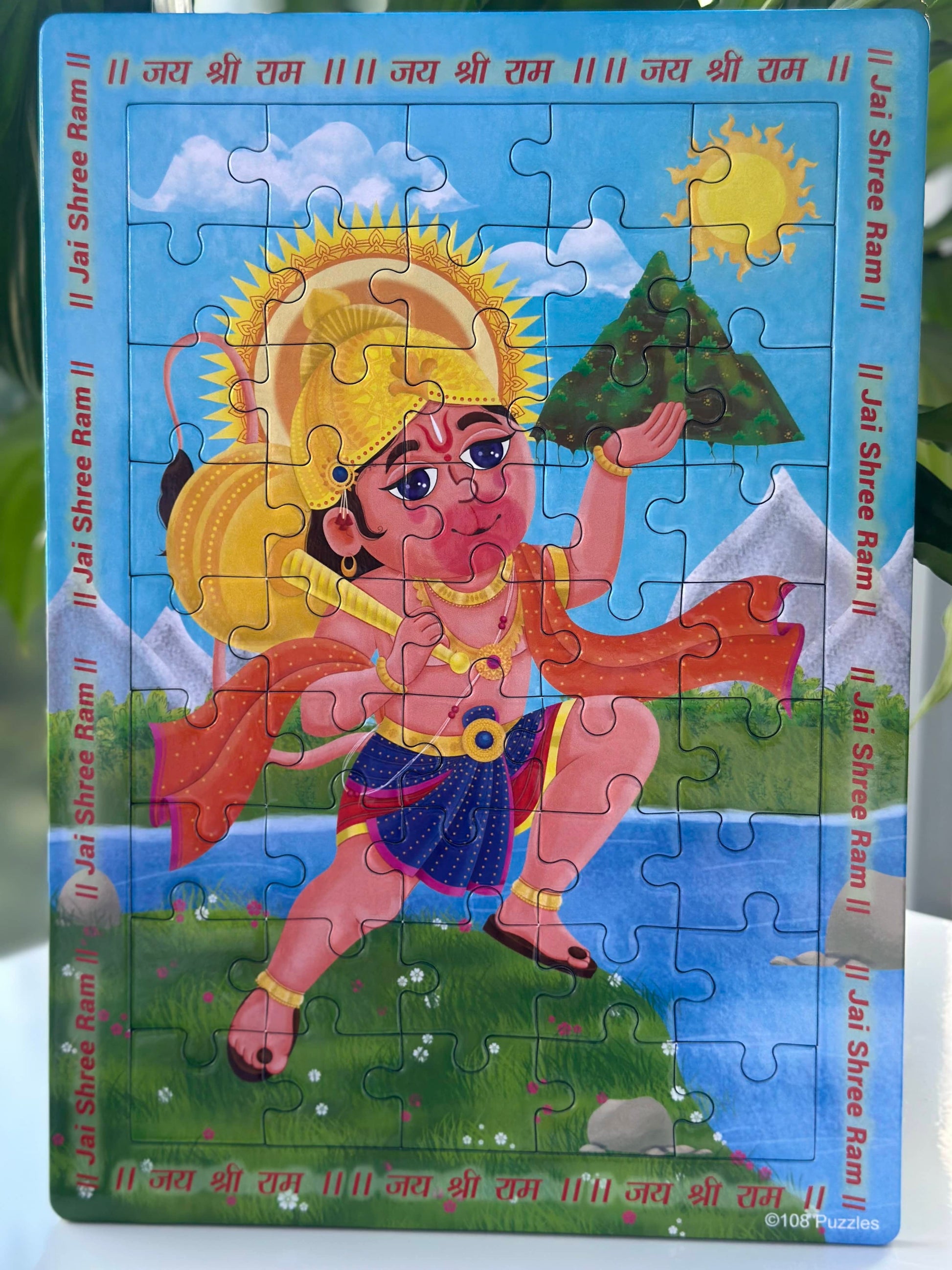 Completed 45 piece puzzle jigsaw puzzle of Hanuman carrying the mountain from the Ramayana