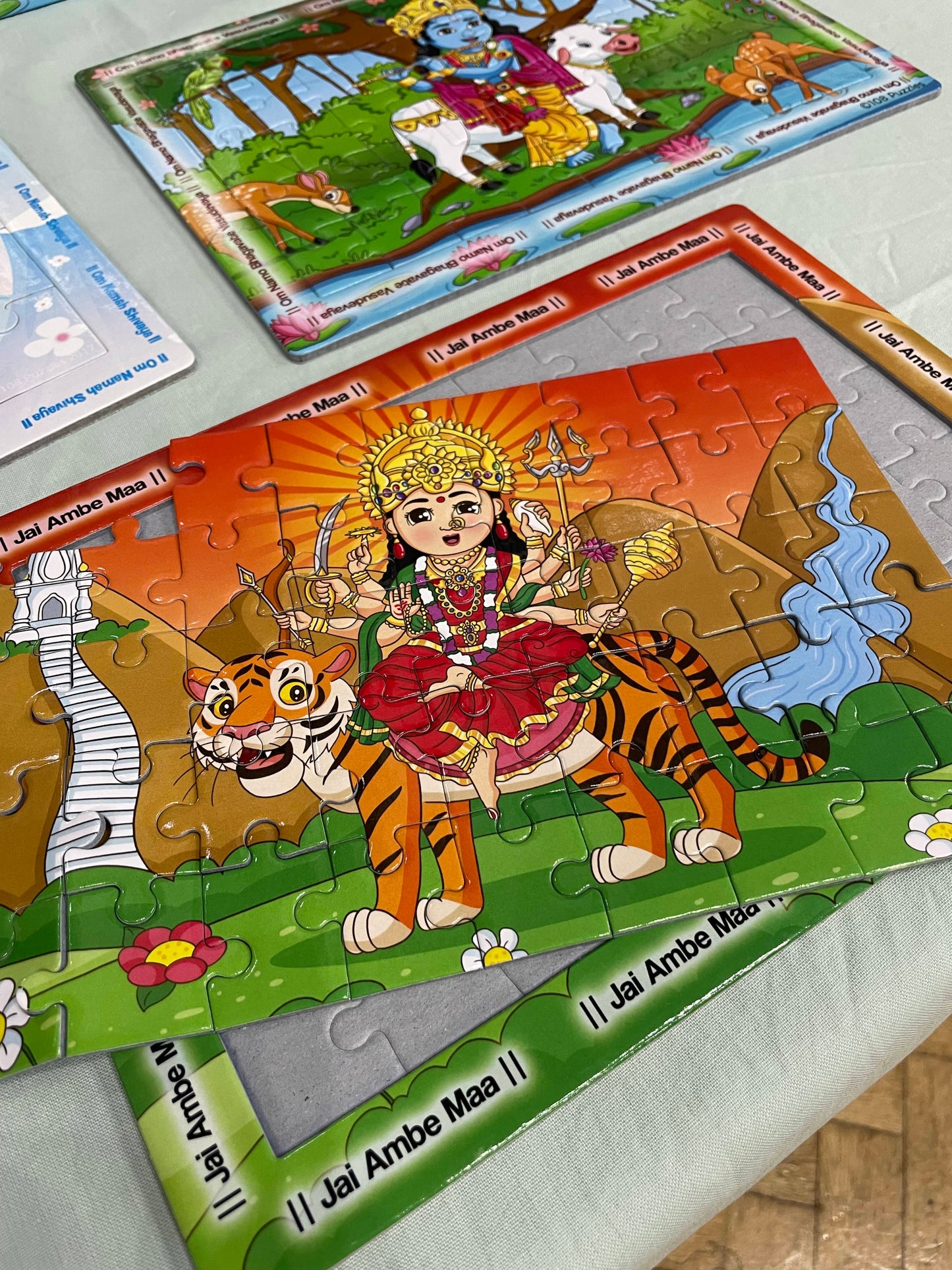 Example of the tray mataji puzzle a bit out of the tray placed on a table
