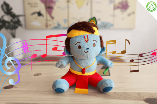 Colorful Krishna plush toy with musical notes on a wooden surface
