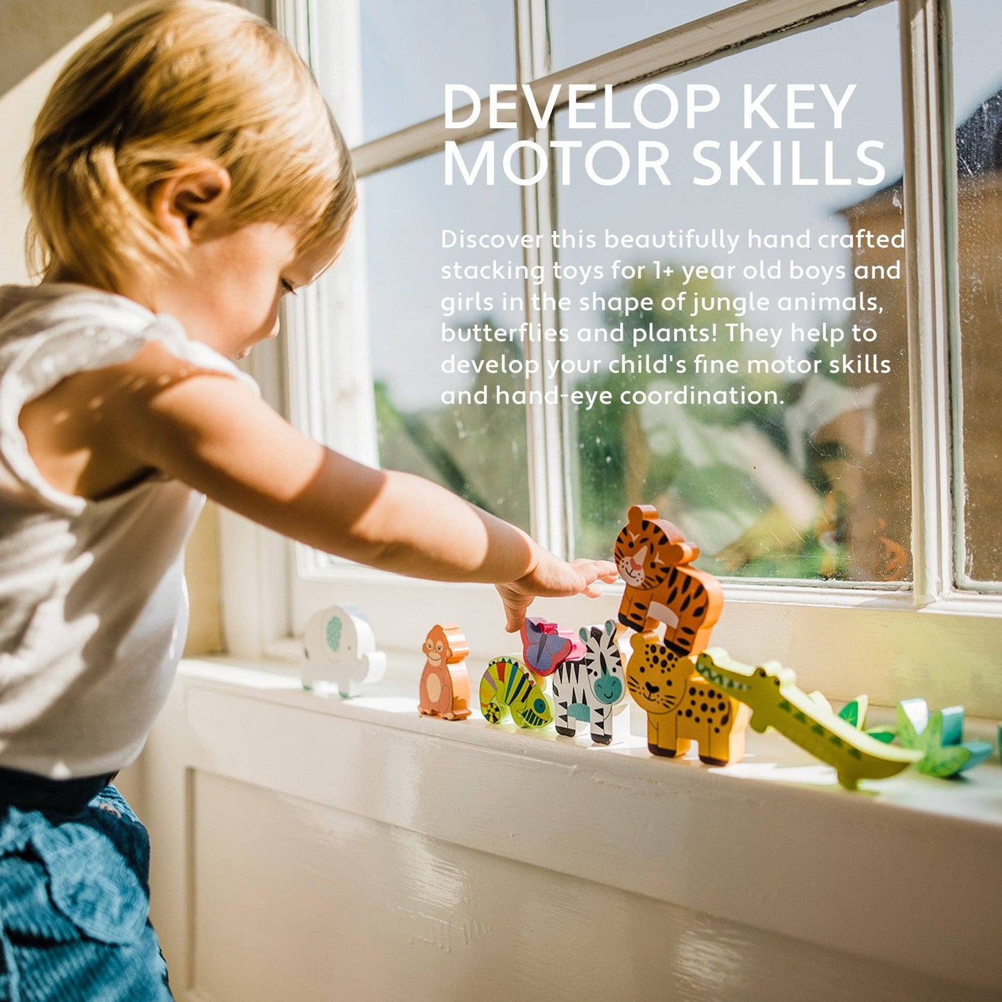 Child playing with wooden toys by a window with text about developing motor skills.